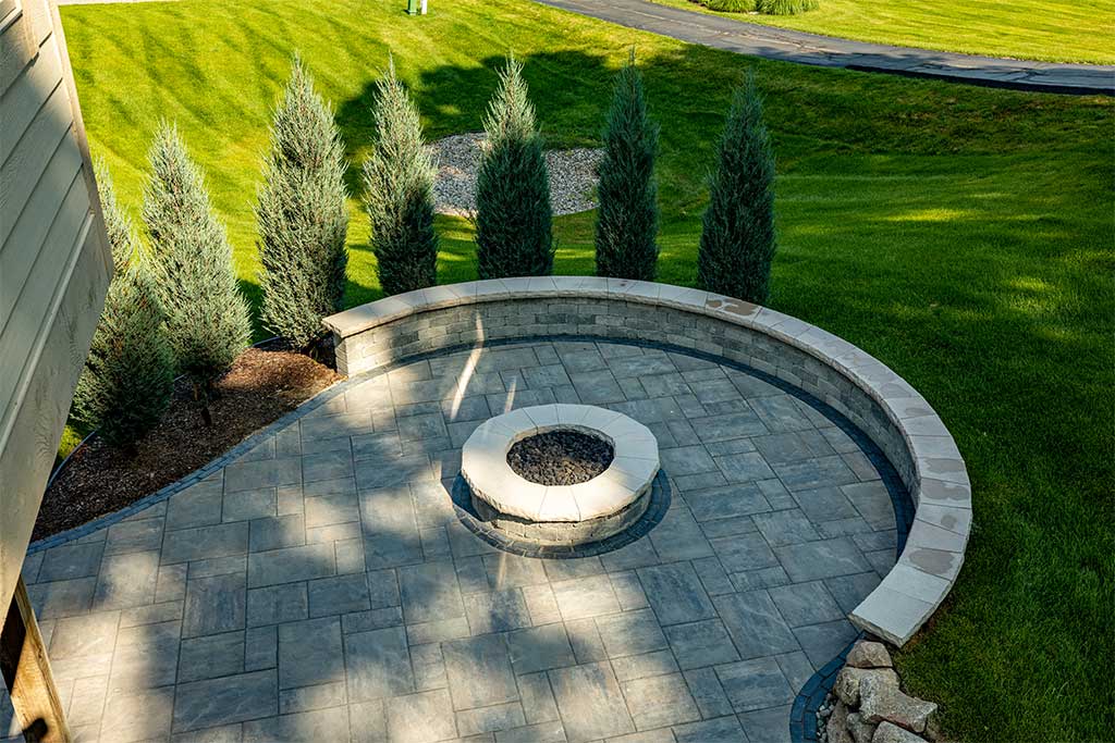 Sleek Firepit, Paver Patio, and Retaining Wall in Howell