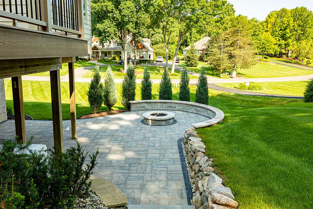 Sleek Firepit, Paver Patio, and Retaining Wall in Howell